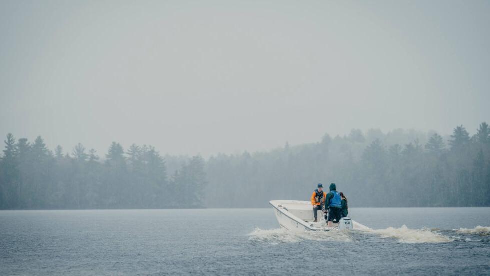 A boat with students on lower st regis lake